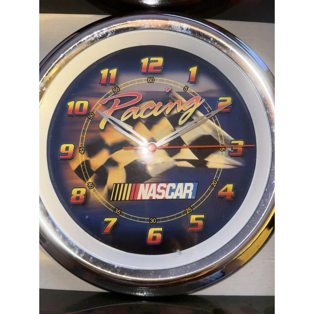 NASCAR RACING 10 INCH METAL WALL CLOCK PORTHOLE SHAPED METAL CASE AND GLASS LENS